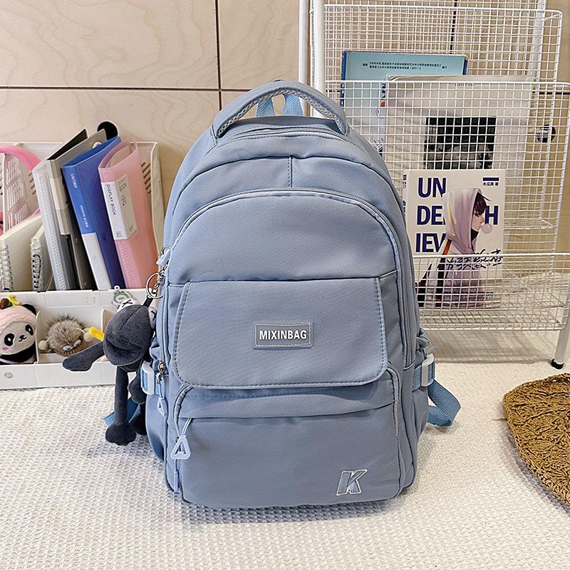 New large-capacity multi-compartment lightweight and versatile backpack fashionable junior high school high school student college backpack