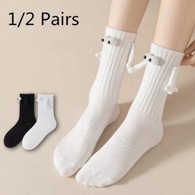 1/2 Paires Chaussettes magnétiques avec mains pour hommes et femmes noir et blanc drôles et mignonnes yeux de dessin animé chaussettes tube 4.9