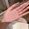 Verstellbares Mikro-Inlay Zirkon Schleifenarmband Luxuriöser Glänzender Kristall Handgelenkschmuck für Damen Geburtstags-Hochzeitsgeschenk