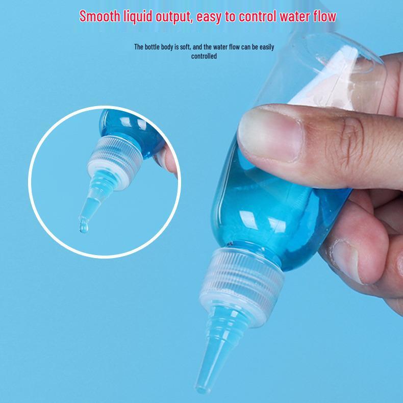 In-stock PET transparent squeeze bottle with pointed nozzle for pigment dispensing, available in 50ml and 100ml sizes. 5ml Squeeze-proof