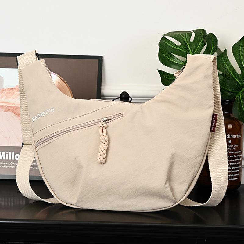 

Женская сумка-пельмень кроссбоди 2025: Универсальная, Вместительная, Легкая Сумка для Поездок и Повседневной Носки для Студентов бежевый