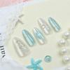 30-Piece Cat Eye Gold Foil Almond-Shaped Nail Art Stickers with Stars and Hearts In Blue Color - High-Quality Wearable Nails.
