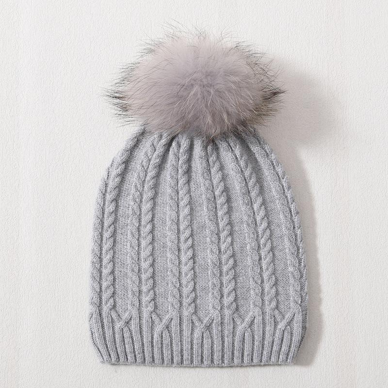 Versatile warm rabbit down knitted hat women's solid color outdoor twist pattern wool hat winter ear protection windproof