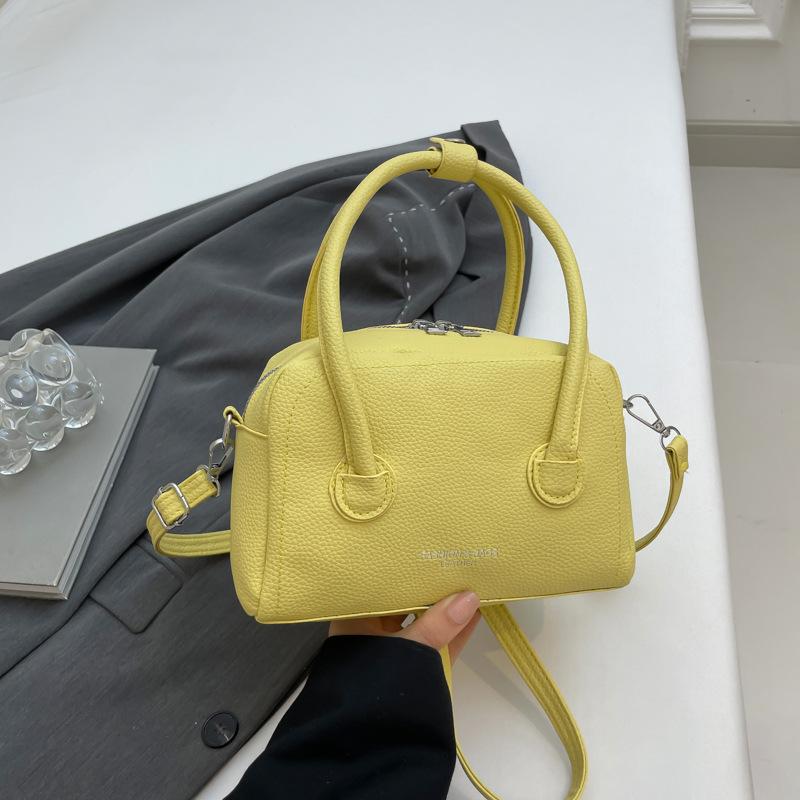 

Нишевый дизайн портативная сумка для боулинга женская 2025 весна новая модная универсальная сумка через плечо для通勤 жёлтый