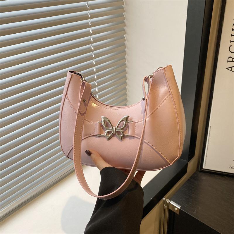 

Premium solid color butterfly beautiful women s shoulder armpit bag summer new versatile fashion simple рожевий