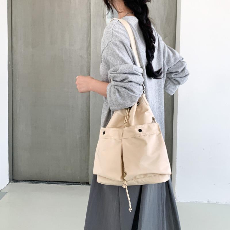 Neuer Kordelzug-Bucket-Bag Damen Crossbody Nylon Tragetasche Großes Fassungsvermögen Damen Lazy Wind Lässige Schultertasche Damen