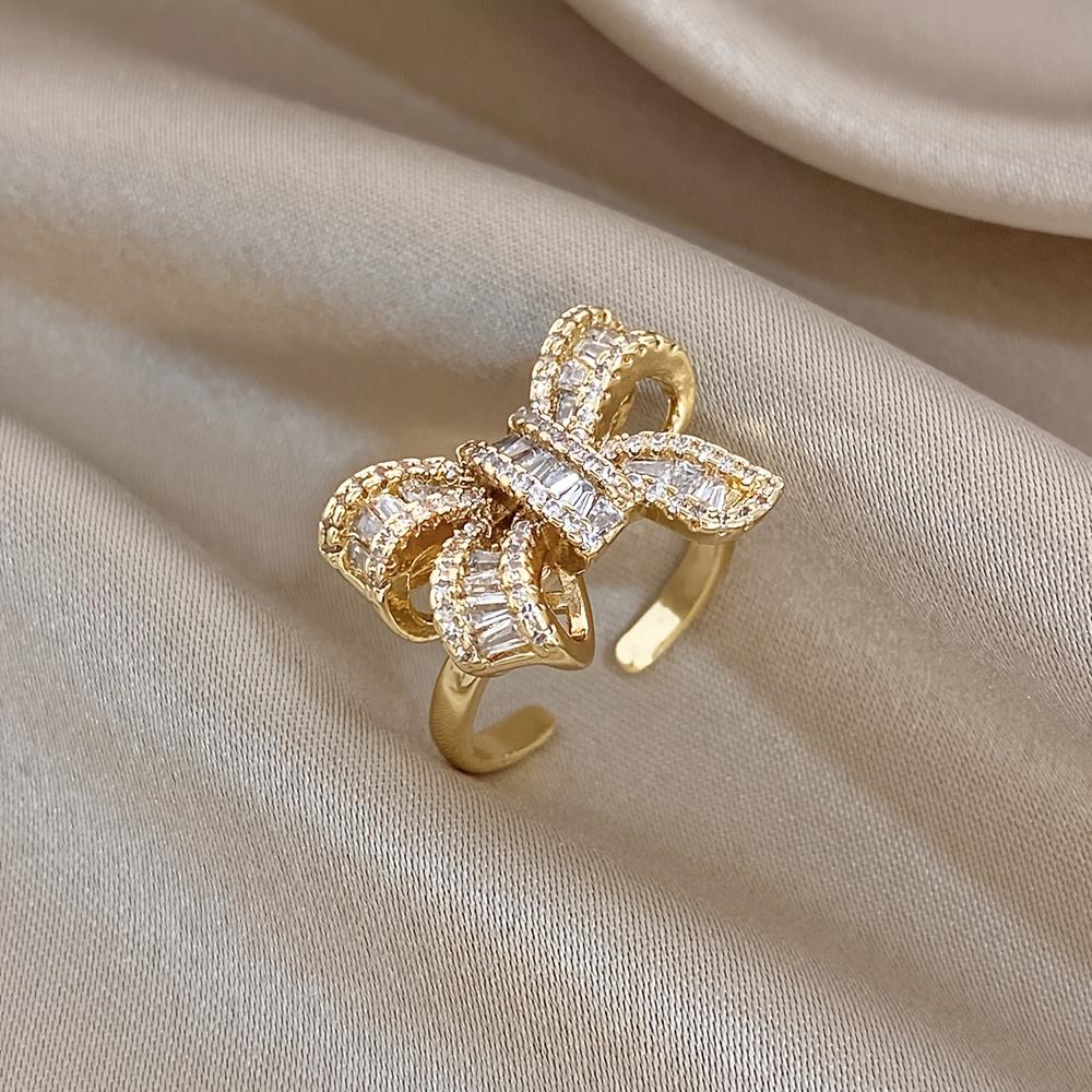 1PC luxury gold-plated synthetic zircon bow ring, with sweet and cool three-dimensional design, niche light luxury fairy style accessories