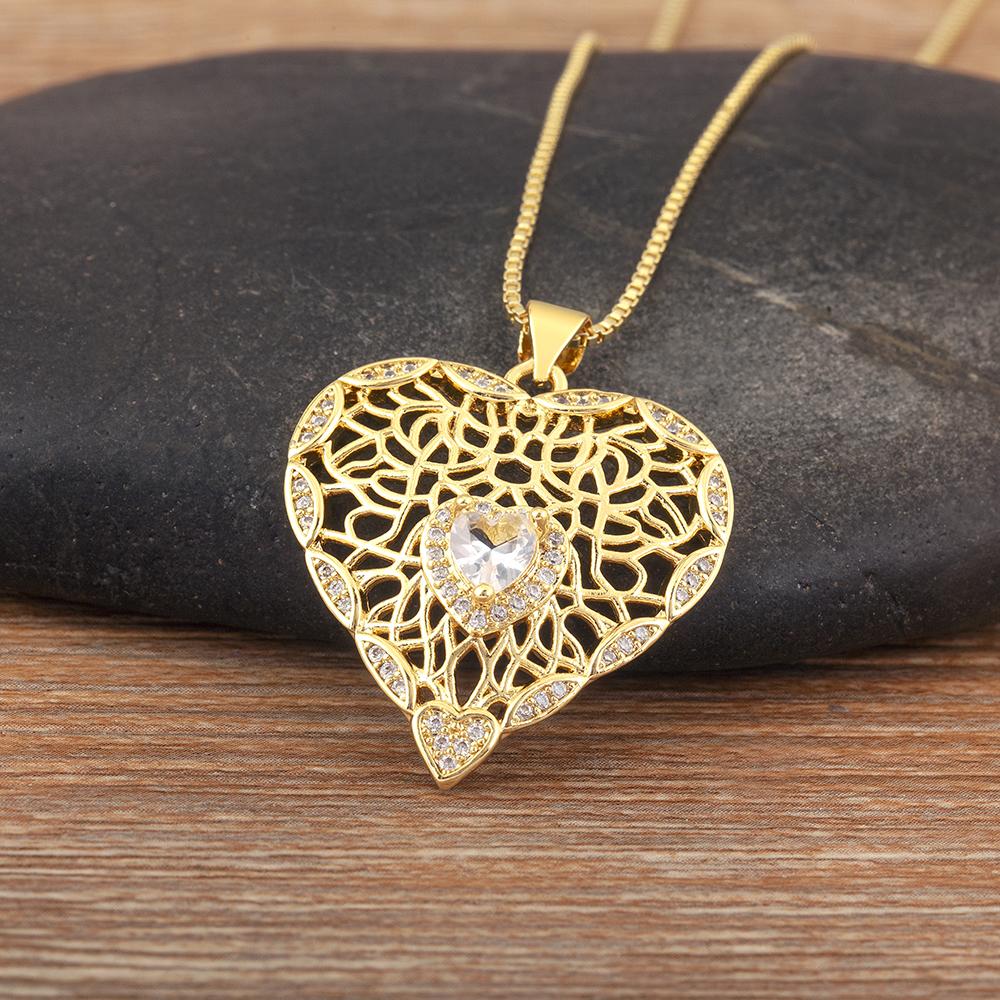 

Nidin New Retro Heart Shape Hollow Design Sparkling Zircon Pendant Necklace For Women Men Vintage Jewelry Wholesale Accessories білий