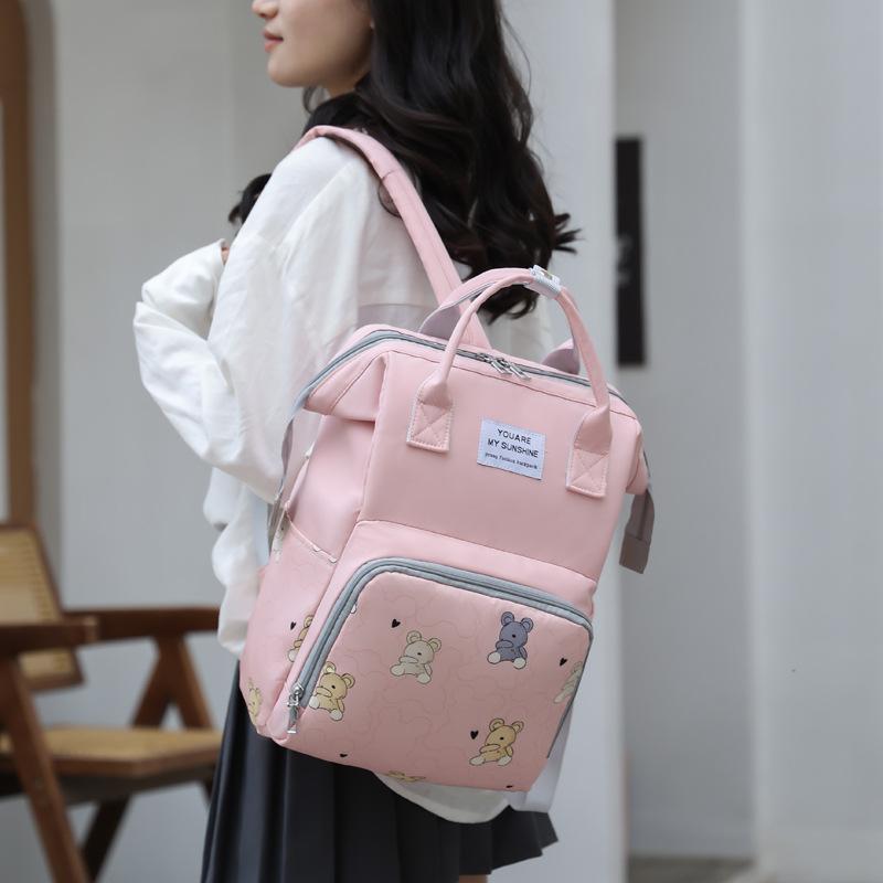New printed mommy bag, multi-functional backpack, fashionable and cute mother and baby bag, mother bag, portable diaper bag.