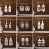 Ethnic Miao Silver Tassel Earrings - Retro Long Dangle Scenic Studs for Women