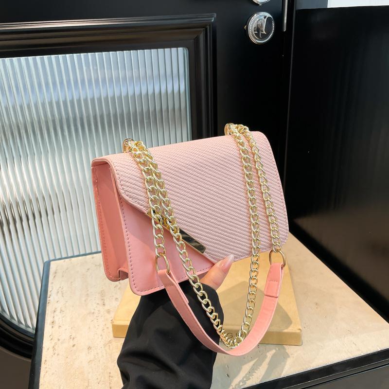 

New solid color textured small square bag popular diagonal iron edge handbag light luxury casual shoulder messenger bag women розовый