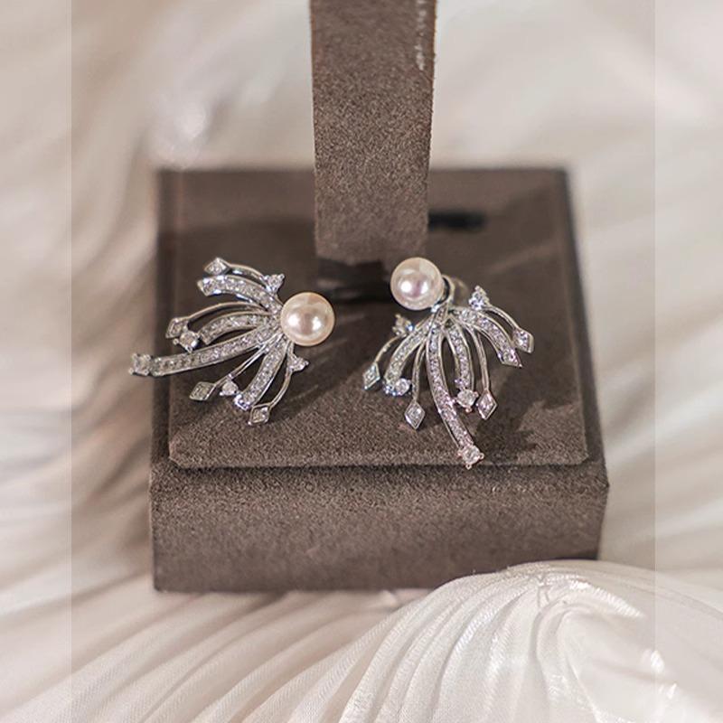 

Fireworks pearl earrings women s new popular light luxury high-end stud earrings niche unique exquisite temperament earrings