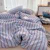 Simple Red And Blue Striped Duvet Cover And Four Piece Bed Sheet Set With Washed Cotton Bedding On The Bed