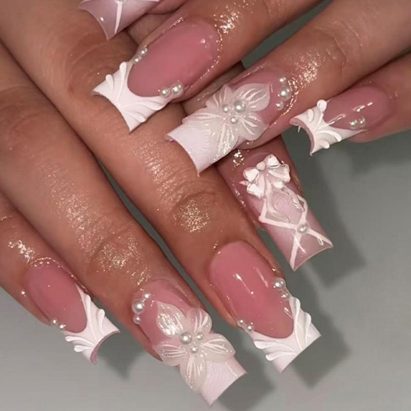 

Lovely French Manicure Press On Nail With Delicate Pearls And Ribbons In White ABS Material 1