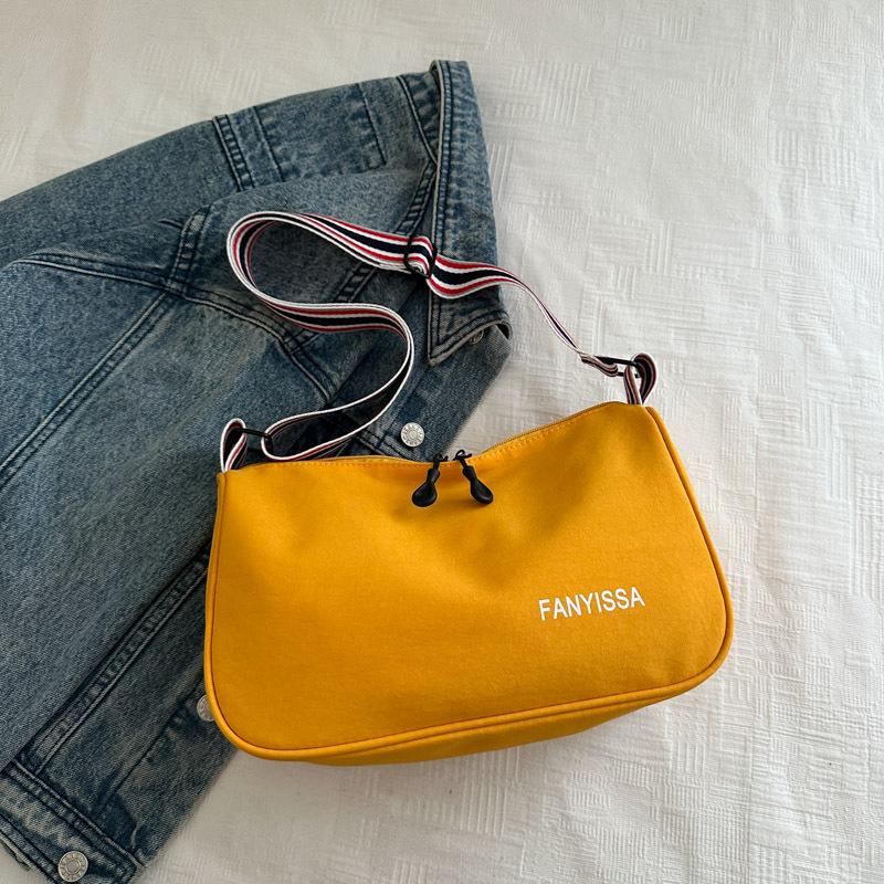 

Nylon cloth casual wide shoulder strap single shoulder small bag women s light and thin new simple commuting high-end niche messenger bag