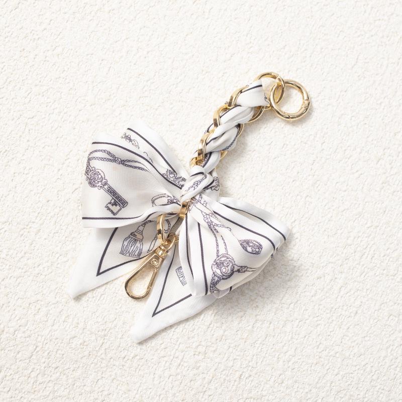 Elegant Hand-Woven Scarf Chain with Bow Decoration Pendant for Bag Strap Modification.
