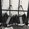 Nieuwe gestreepte schoudertas met grote capaciteit, trendy, cool, lui, mode, veelzijdige sport-, reis-, fitness tas