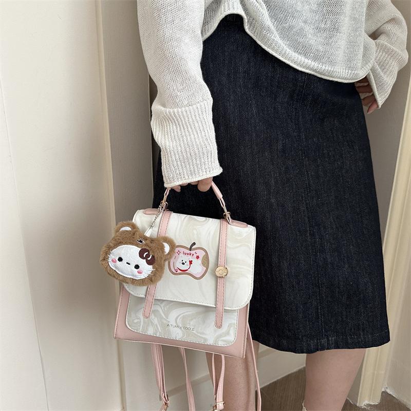 Premium sense cute sweet backpack women's new temperament commuting Korean version niche design crossbody backpack