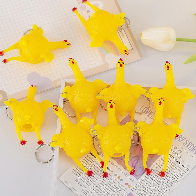 Cartoon Squeezing Egg-Laying Hen Keychain - Fun Stress Relief and Prank Toy
