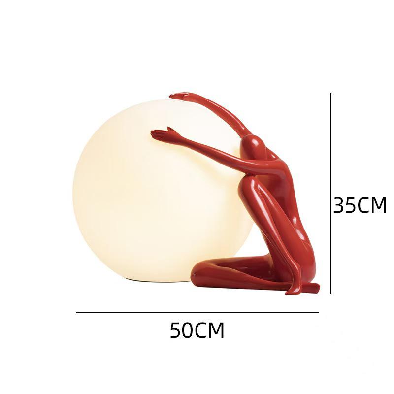 Modern Nordic Table Lamp Sculpture: Creative Doll Holding Luminous Ball for Bedroom and Living Room Decor