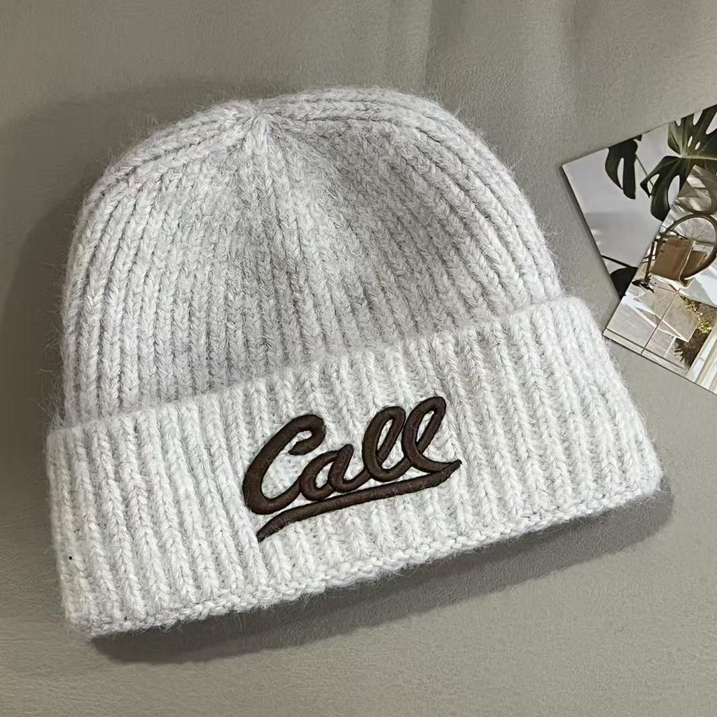 Autumn and winter new fashion letter embroidery knitted hat Korean version versatile solid color big head circumference shows the face small warm