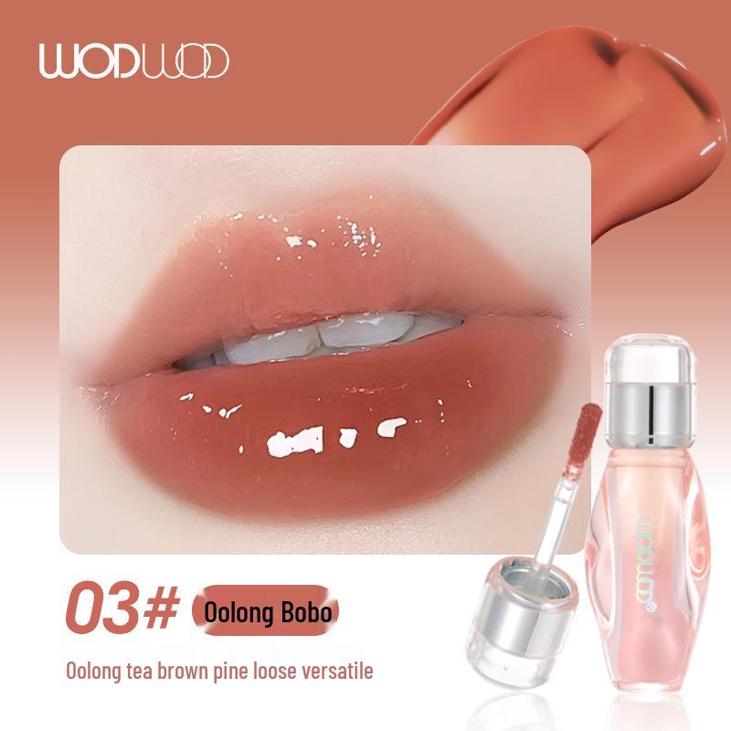 

Наповнюючий блиск для губ WODWOD: Блискуча, зволожуюча, стійка, відбілююча олія для губ для жінок.