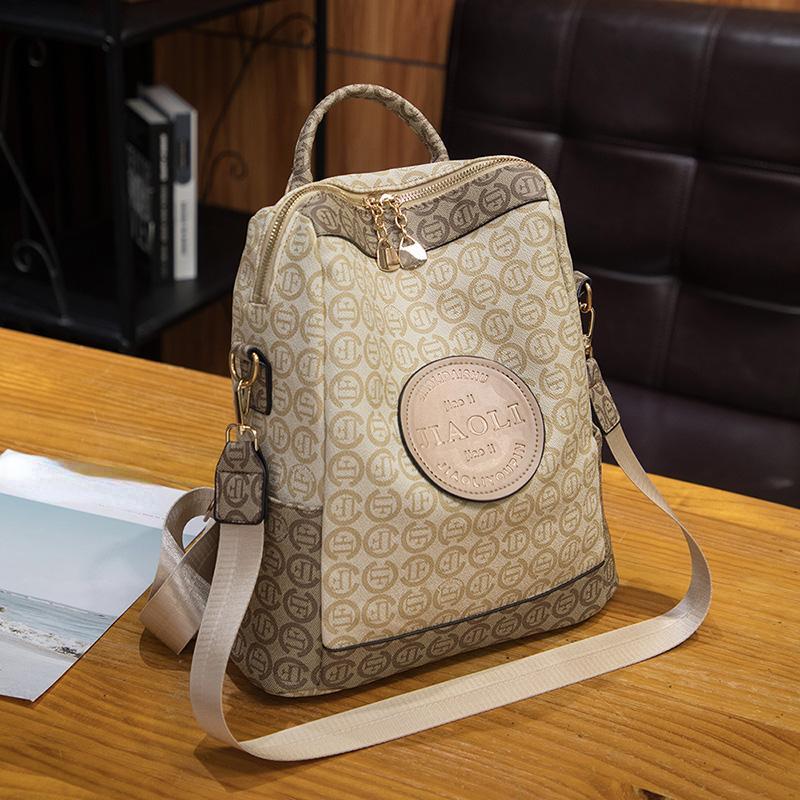 Nový slavný dámský batoh s retro potiskem Batoh Velkokapacitní Cestovní batoh Splash Vysoce kvalitní školní taška přes rameno z PU kůže