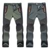 Men's Women's Warm Outdoor Hiking Ski Pants With Cozy Fleece And Waterproof Fabric
