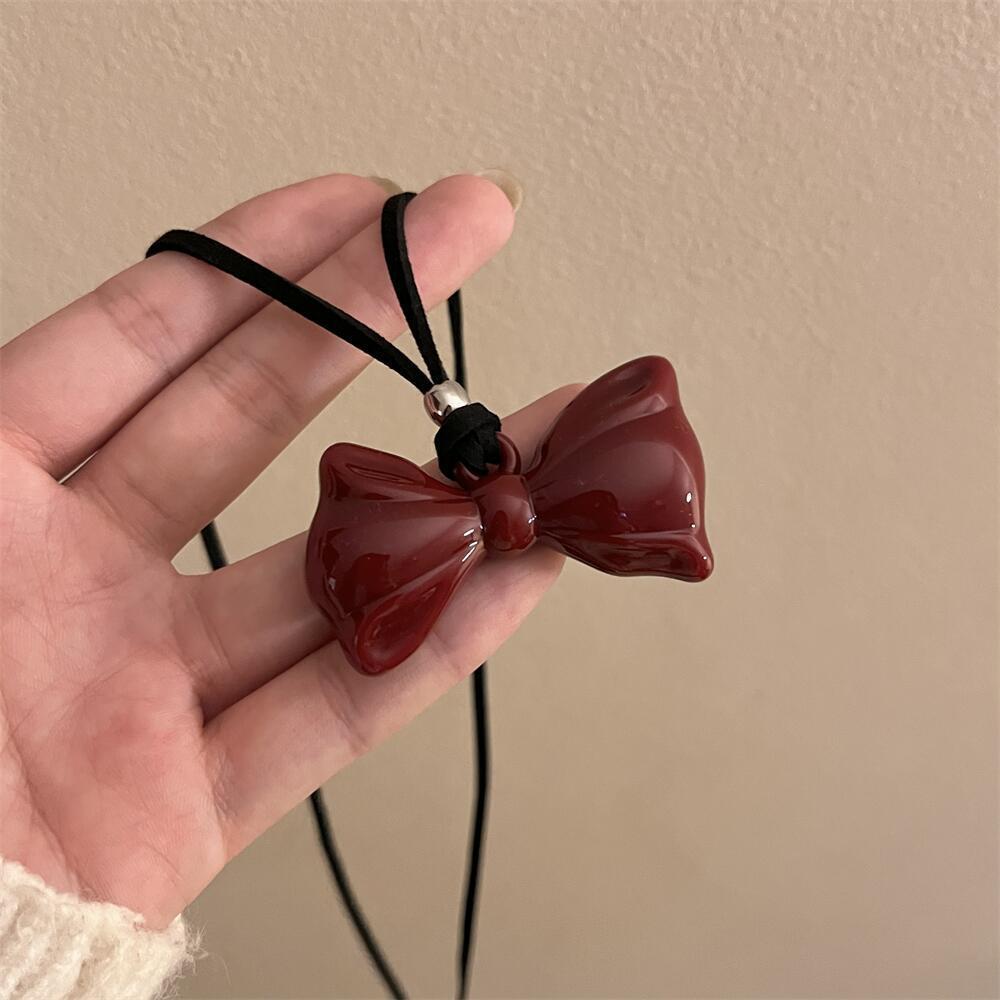 Autumn and Winter Wine Red Ribbon Bow Pendant Necklace Female Love Ankola Red Long Sweater Chain Versatile Accessories