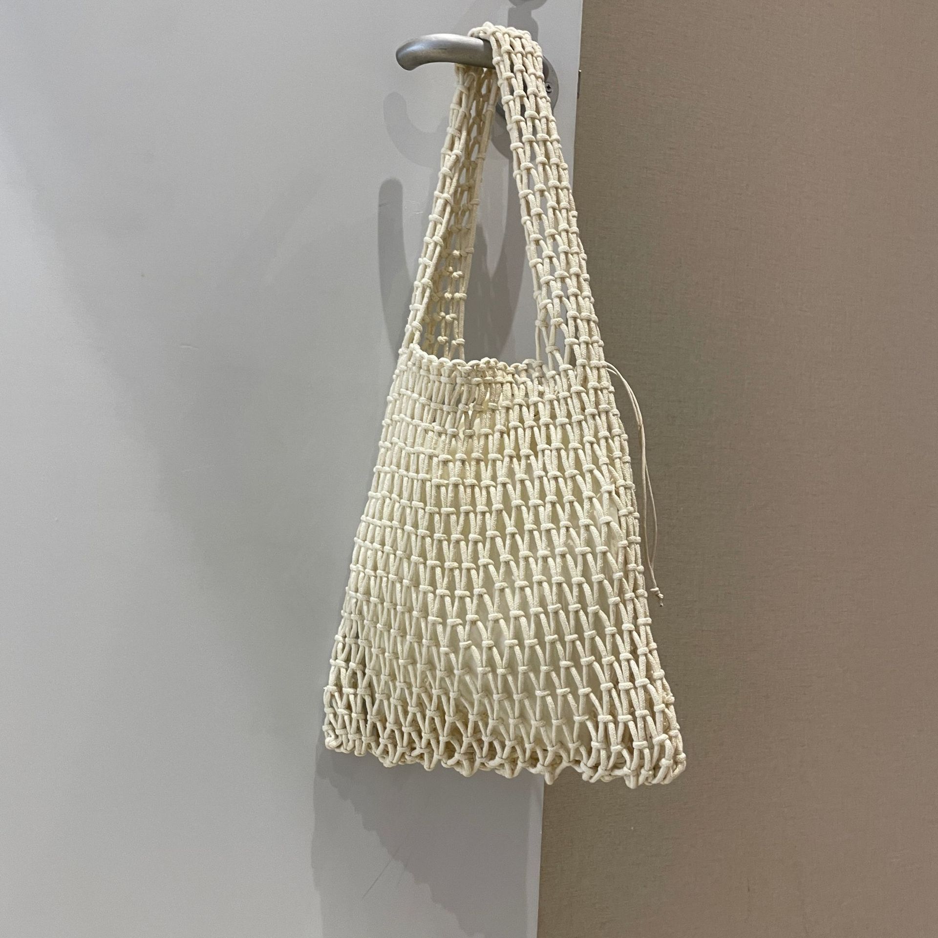 

Beach Hollow Handbag for Women Straw Rope Hollow Out Hand Woven Totes Bag Knitting Handbag Purses Bags for Women 2026 Summer