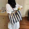 Foreign gas bag women's bag 2025 new Korean version contrasting color vertical stripe underarm tote bag fashionable shoulder bag