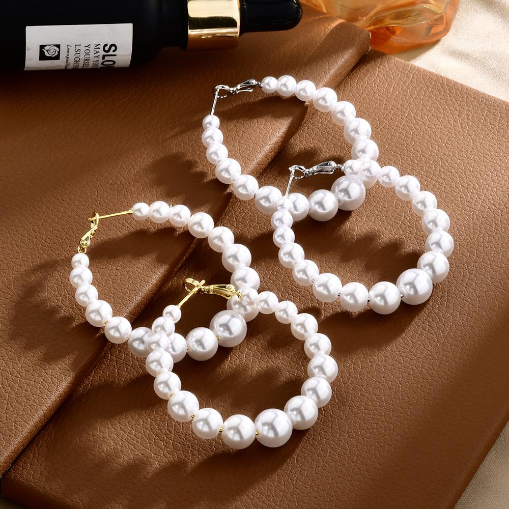 Simple and fashionable large circle pearl earrings temperament celebrity exaggerated personality earrings niche design sense light luxury earrings