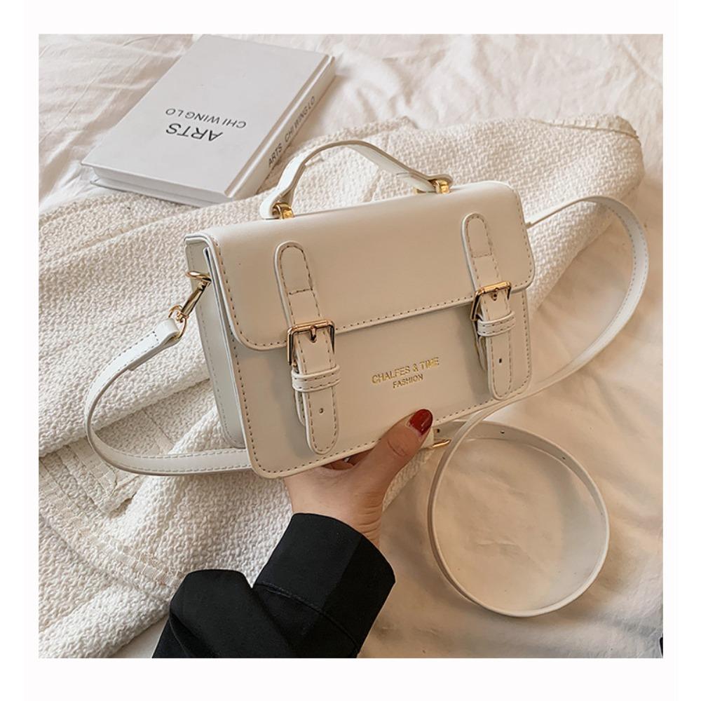 This year's popular bags are women's autumn and winter new high-end niche design messenger bags, foreign-style portable small square bags.