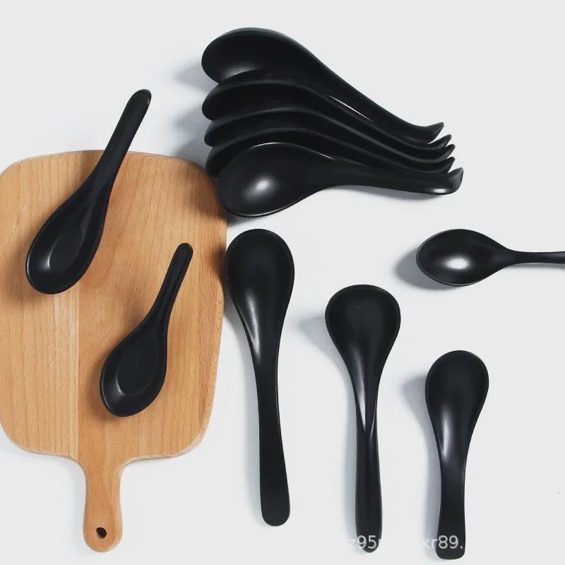 A5 Black Matte Melamine Long Handle Soup Spoon - Food Grade Porcelain Imitation for Restaurants, Hotels, and Hot Pots.
