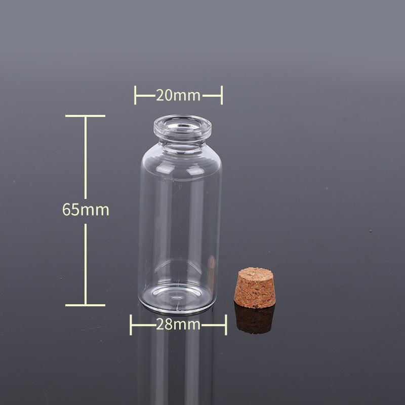 Kleine durchsichtige Glasflasche mit Korken