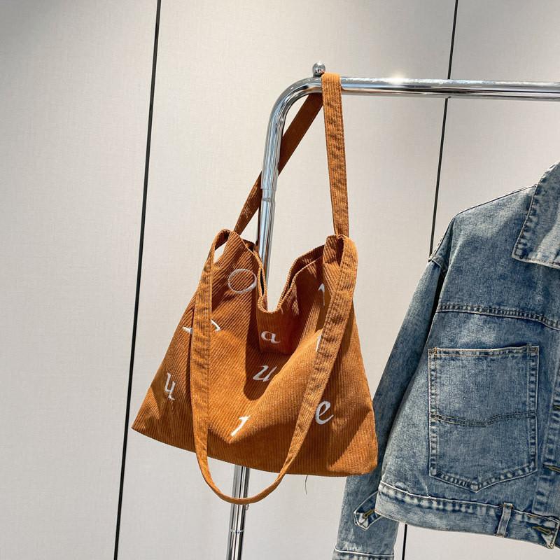 

Chic White Corduroy Tote Bag Featuring Large Capacity And Artistic Vibe For Everyday Fashion коричневий