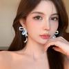 Exquisite Rhinestone Bow Tassel Earrings: Silver Needle French Court Style Luxury Ear Studs for Women.
