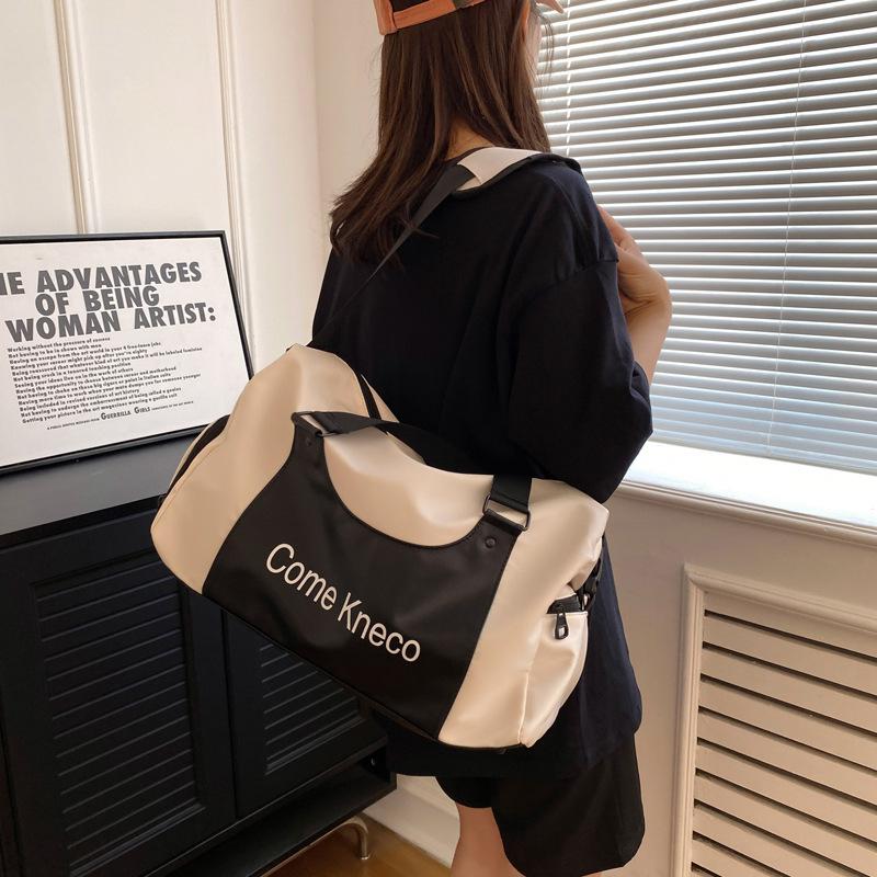 Fashion trend design model, go out, portable travel bag, wet and dry separation shoes, warehouse model, fitness bag, can cover the tie rod.