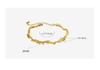 Irregular Inlaid Zircon Titanium Steel Bracelet with 18K Gold Plating