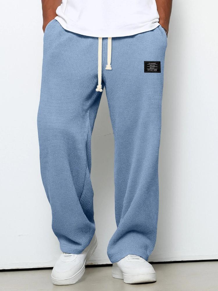 Pantaloni della tuta casual sportivi a gamba dritta in maglia waffle con elastico e coulisse a vita media