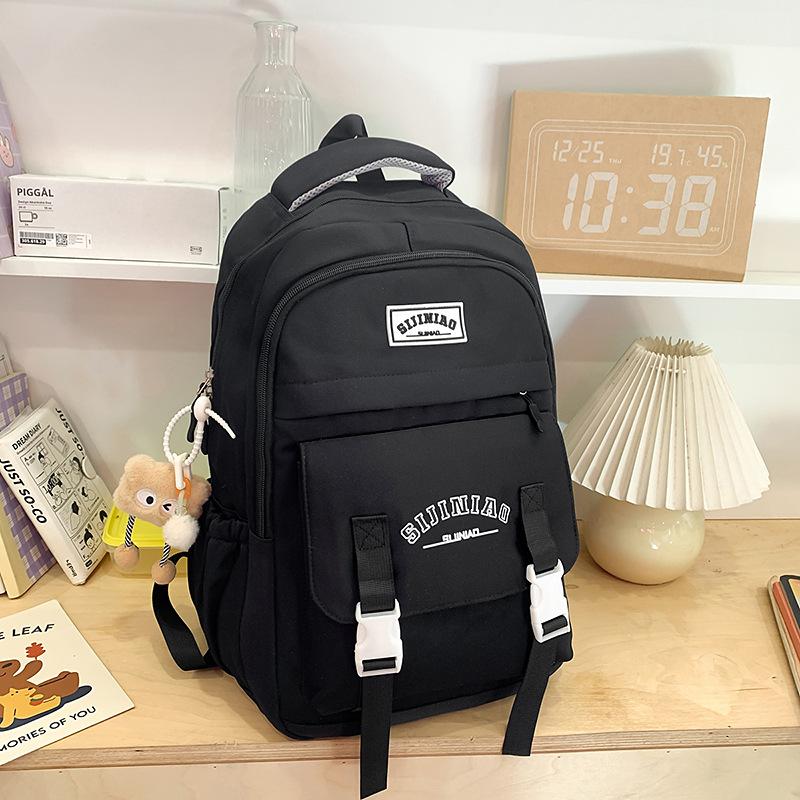 

Student schoolbag lightweight large-capacity junior high school backpack letter printing high-value backpack men s and women s spine bag чорний