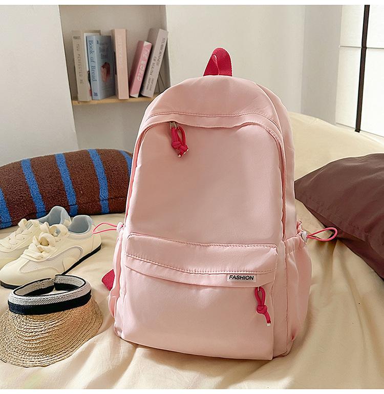 Schoolbag Korean version ins Solid color simple schoolbag Lazy wind backpack Female junior and high school students lightweight large-capacity 
