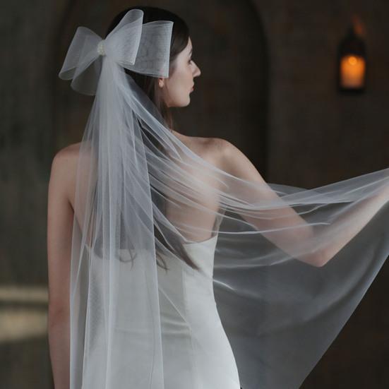 

Свадебная двухслойная фата с бантом и искусственным жемчугом, элегантная свадебная длинная фата для женщин и девочек, вуаль, аксессуар для волос