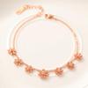 Bracelet de cheville en titane plaqué or Daisy - Style forêt pour femme, niche Ins haut de gamme, design de fleur fraîche et douce, ne se décolore pas.