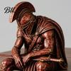 Handcrafted Decorative Figures Ancient Greek Warrior Shelf Sitter Statue, Sitting Soldier Figurine with Mythology Fan Gifts Helmet, Historical Desktop