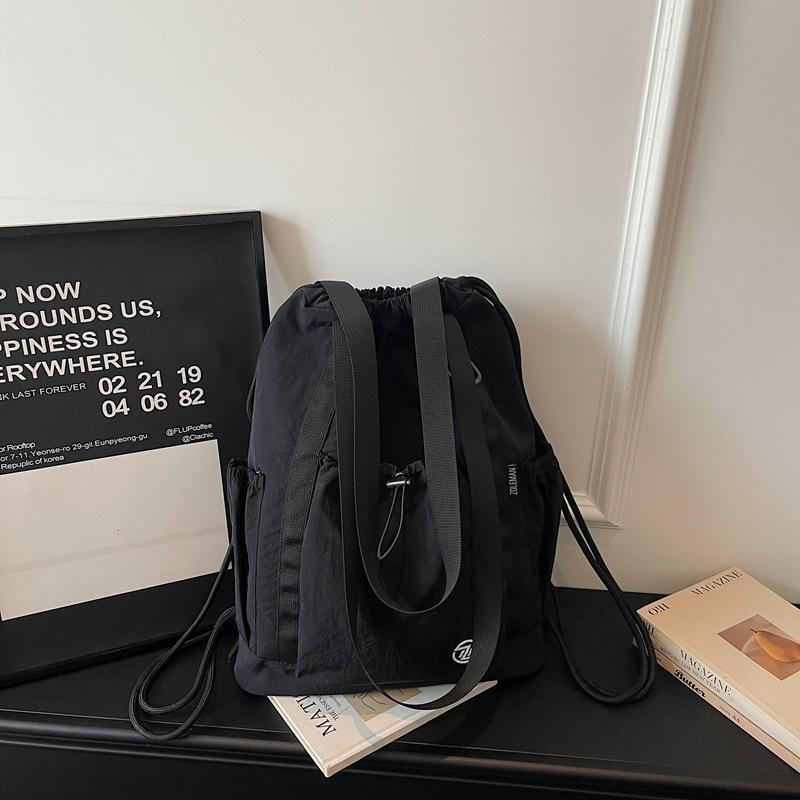 2026 Spring New Outdoor Backpack Large Capacity Simple Fashionable Lightweight Cloth Bag Travel Shoulder Bag Casual School Bag