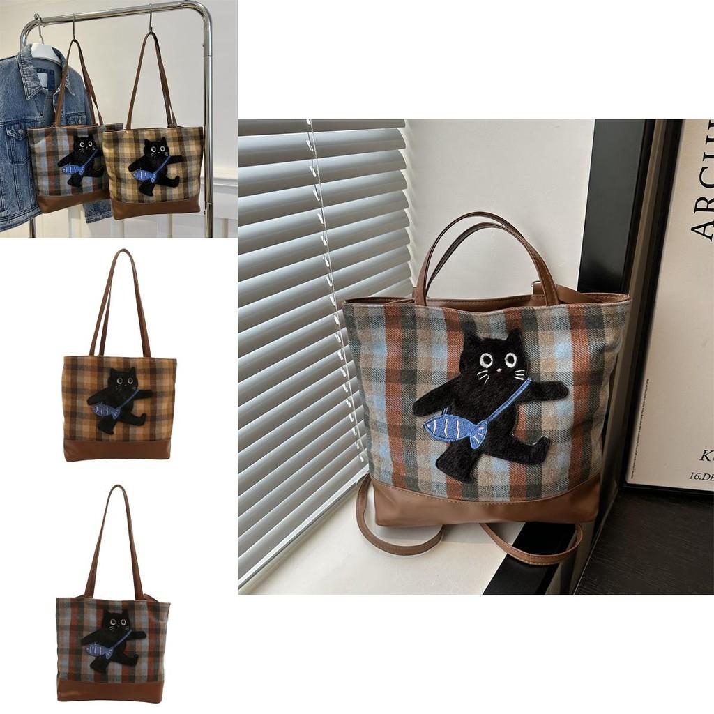 Stilvolle, geräumige Schultertasche mit Cartoon-Motiv aus der Winterkollektion in Blau und Braun