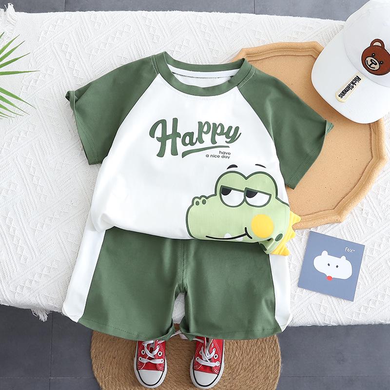 

Летний комплект из двух предметов для мальчиков 2025 года: футболка с коротким рукавом и шорты с мультяшным динозавром 110cm зелёный