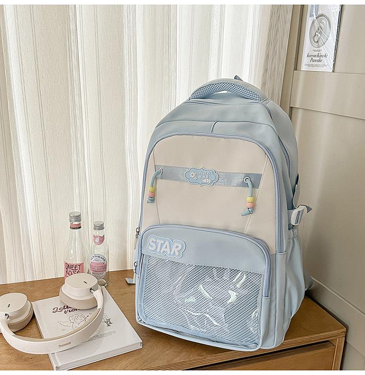Small fresh contrasting color schoolbag niche design casual versatile children's backpack high value light burden reduction shoulder