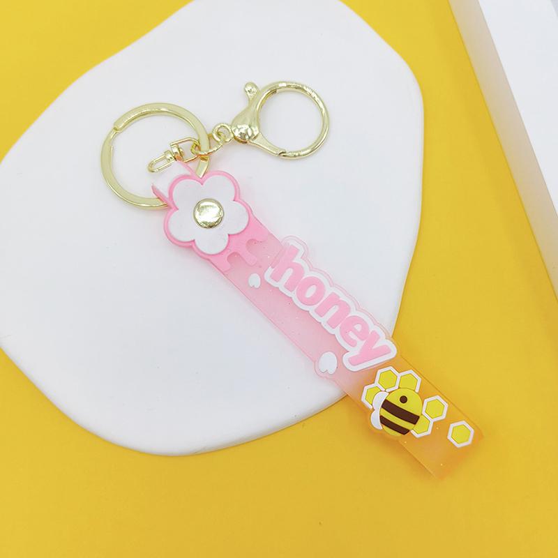 Transparent Pvc Soft Rubber Rope Keychain English Small Flower Jelly Color Plum Blossom Candy Color Drop Adhesive Wristband